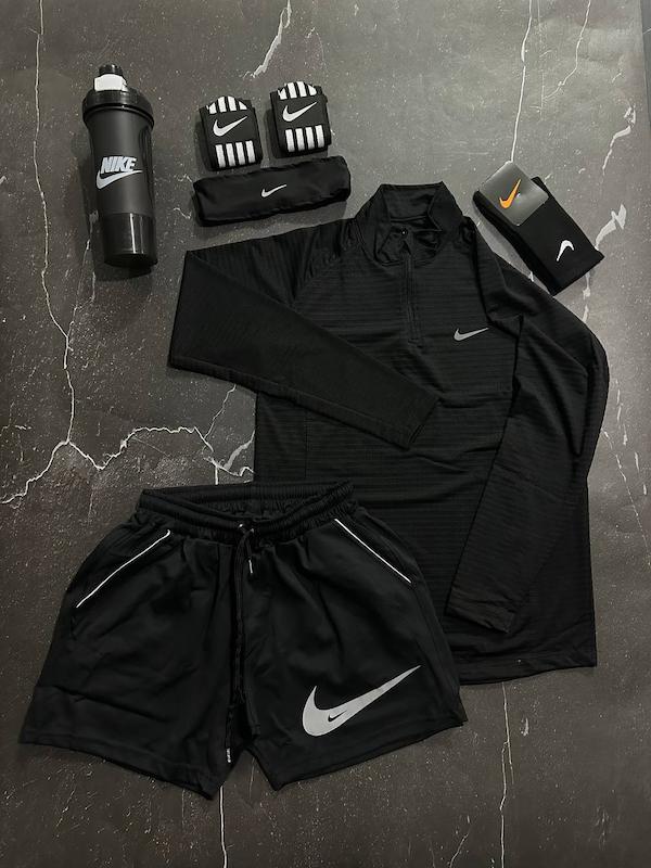 پکیج کد S3126 شامل تیشرت آستین بلند نیم زیپ + شلوارک + هدبند + مچ بند چسب نانو + شیکر دو تیکه + جوراب ساقدار با تم مشکی