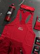 پکیج کد S3135 شامل رکابی قهرمانی + شلوارک کشاله دار + شیکر دو تیکه + مچبند چسب نانو + هدبند + جوراب ساقدار با تم قرمز