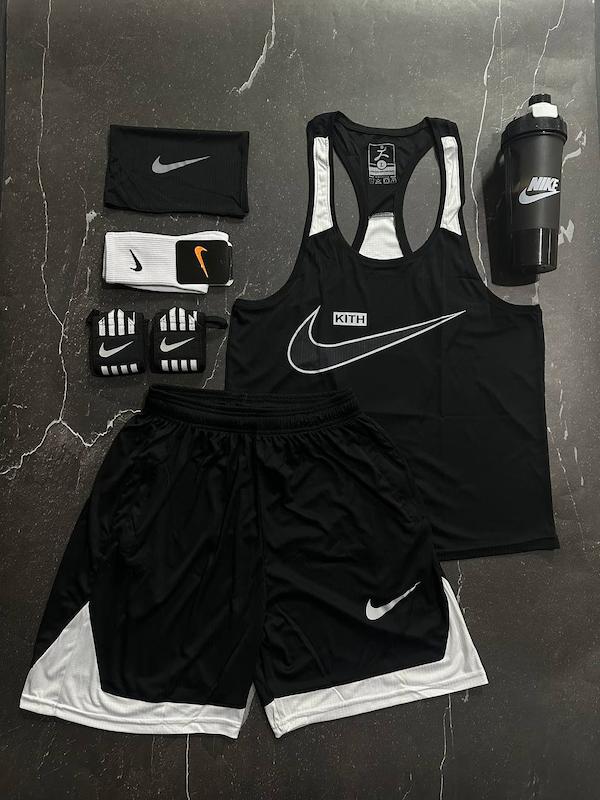 پکیج کد S3136 شامل رکابی قهرمانی + شلوارک + اسکارف + شیکر دو تیکه + مچبند چسب نانو + جوراب ساقدار با تم مشکی سفید