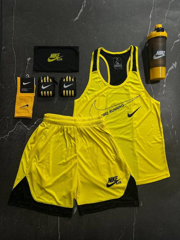 پکیج کد S3142 شامل رکابی قهرمانی + شلوارک + اسکارف + شیکر دو تیکه + مچبند چسب نانو + جوراب ساقدار با تم زرد مشکی