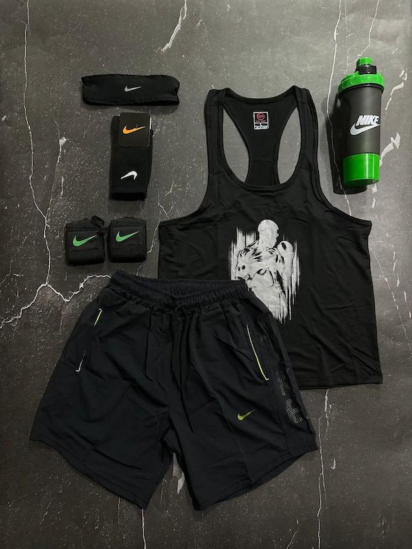 پکیج کد S3150 شامل رکابی قهرمانی + شلوارک + مچبند چسب نانو + جوراب ساقدار + هدبند + شیکر دو تیکه با تم مشکی 