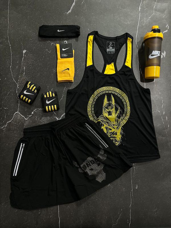 پکیج کد S3152 شامل رکابی قهرمانی + شلوارک + مچبند چسب نانو + جوراب ساقدار + هدبند + شیکر دو تیکه با تم مشکی زرد