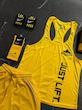 پکیج کد S3174 شامل رکابی قهرمانی + شلوارک + مچبند چسب نانو + جوراب ساقدار + شیکر دو تیکه با تم زرد