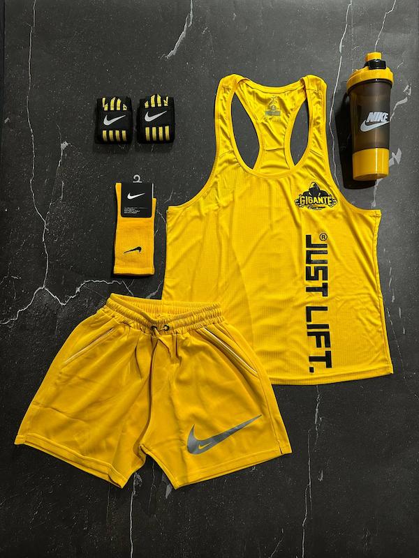 پکیج کد S3174 شامل رکابی قهرمانی + شلوارک + مچبند چسب نانو + جوراب ساقدار + شیکر دو تیکه با تم زرد