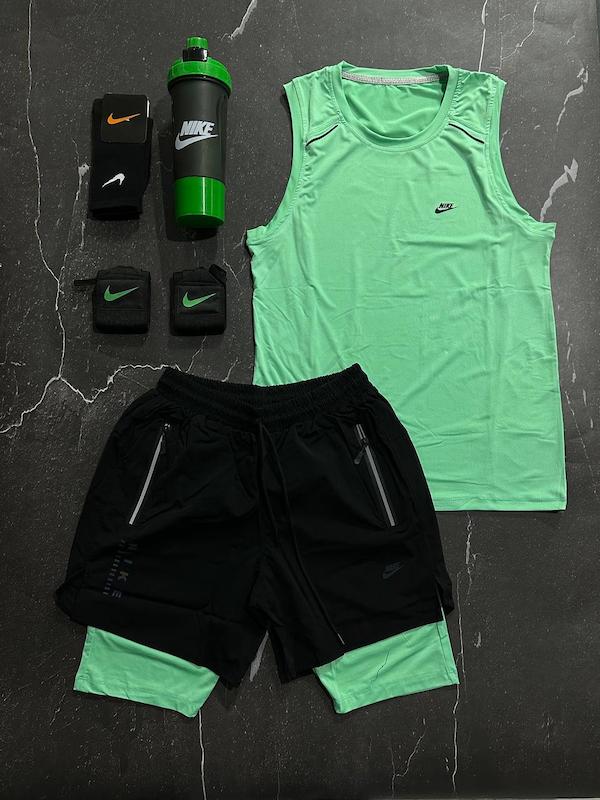 پکیج کد S3177 شامل رکابی حلقه ای + شلوارک کشاله دار + مچبند چسب نانو + جوراب ساقدار + هدبند + شیکر دو تیکه با تم سبز مشکی