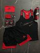 پکیج کد S3179 شامل رکابی قهرمانی + شلوارک + اسکارف + مچبند چسب نانو + جوراب ساقدار + شیکر دو تیکه با تم مشکی قرمز