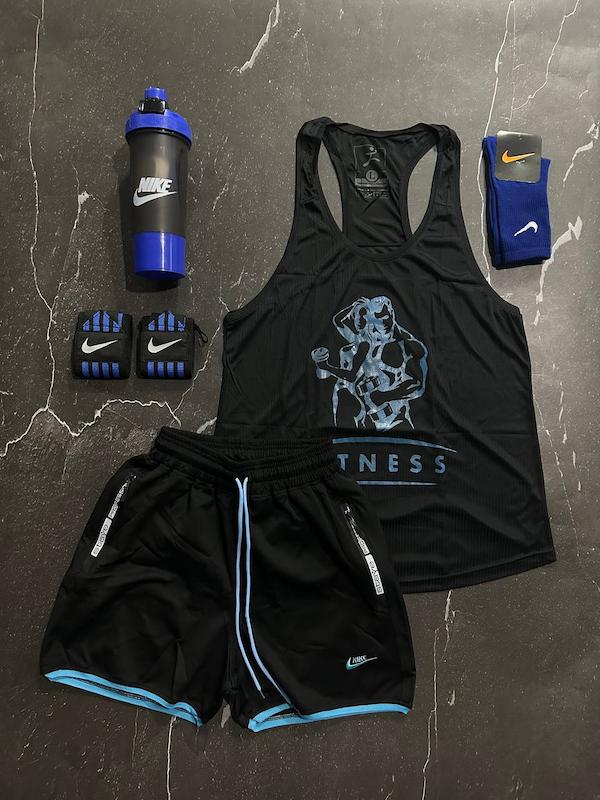 پکیج کد S3183 شامل رکابی قهرمانی + شلوارک + مچبند چسب نانو + جوراب ساقدار + شیکر دو تیکه با تم مشکی آبی