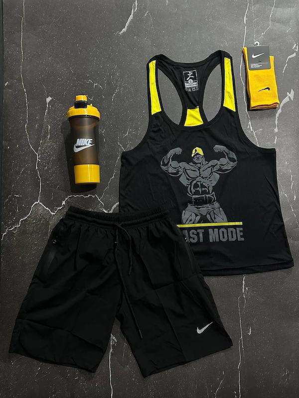 پکیج کد S3185 شامل رکابی قهرمانی + شلوارک + جوراب ساقدار + شیکر دو تیکه با تم مشکی زرد