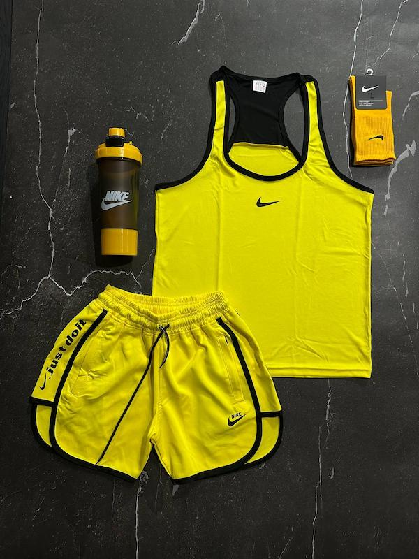 پکیج کد S3186 شامل رکابی قهرمانی + شلوارک + جوراب ساقدار + شیکر دو تیکه با تم زرد