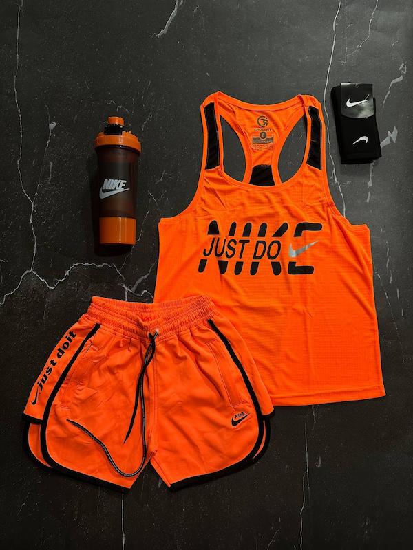 پکیج کد S3187 شامل رکابی قهرمانی + شلوارک + جوراب ساقدار + شیکر دو تیکه با تم نارنجی مشکی