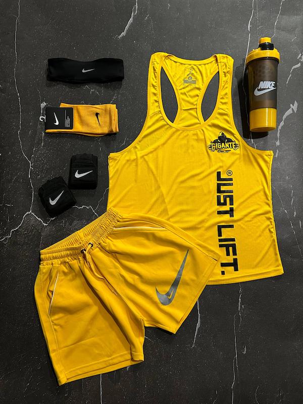 پکیج کد E1979 شامل رکابی قهرمانی + شلوارک + جوراب ساقدار + شیکر دو تیکه + مچ بند چسب نانو + هدبند با تم زرد 💛🔥  