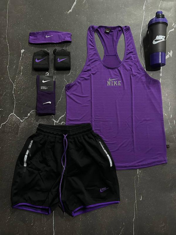 پکیج کد S3203 شامل رکابی قهرمانی + شلوارک + هدبند + مچبند چسب نانو + جوراب ساقدار + شیکر دو تیکه با تم بنفش مشکی