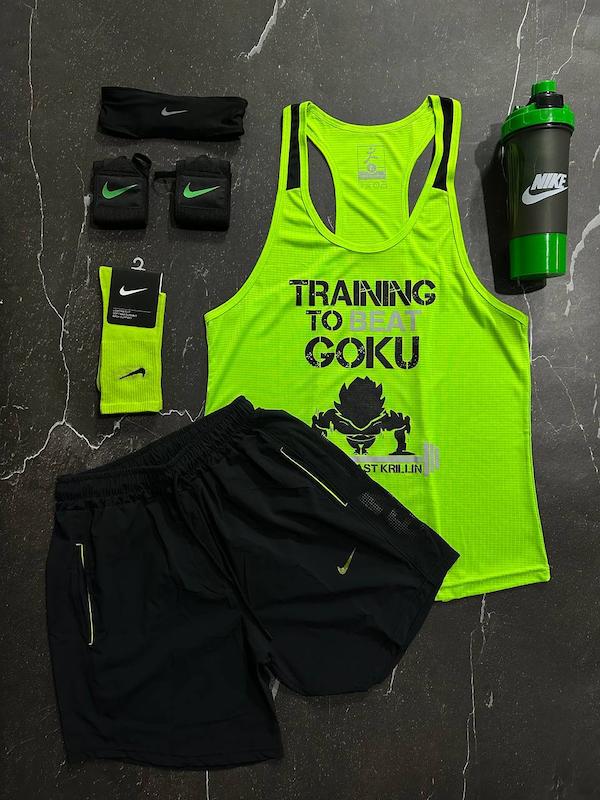 پکیج کد S3225 شامل رکابی قهرمانی + شلوارک + هدبند + مچبند چسب نانو + جوراب ساقدار + شیکر دو تیکه با تم فسفری نوک مدادی