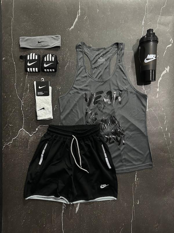 پکیج کد E1985 شامل رکابی قهرمانی + شلوارک + جوراب ساقدار + شیکر دو تیکه + مچ بند چسب نانو + هدبند با تم طوسی مشکی 🖤🔥