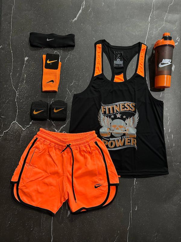 پکیج کد E1989 شامل رکابی قهرمانی + شلوارک + جوراب ساقدار + شیکر دو تیکه + مچ بند چسب نانو + هدبند با تم مشکی نارنجی 🖤🧡