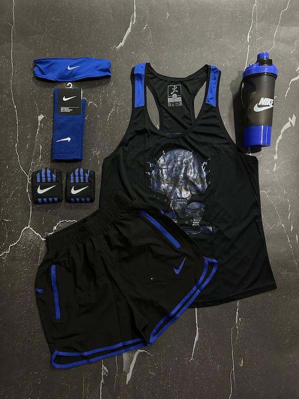 پکیج کد E1996 شامل رکابی قهرمانی + شلوارک + جوراب ساقدار + شیکر دو تیکه + مچ بند چسب نانو + هدبند با تم مشکی آبی 🖤💙  