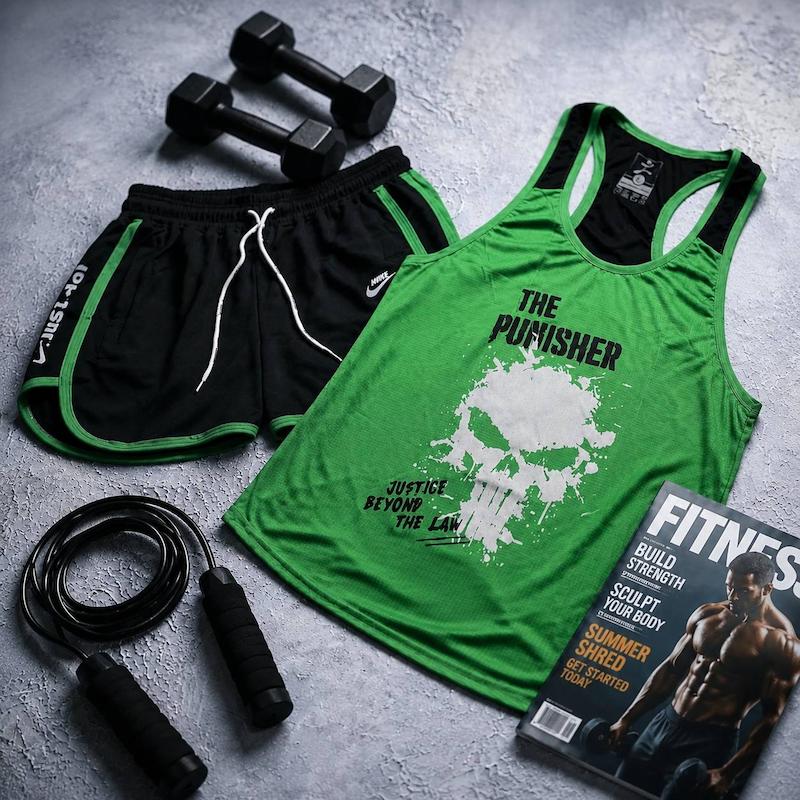 پکیج کد E2190 ست باشگاهی مردانه طرح پانیشر شامل رکابی + شلوارک با تم مشکی سبز🖤💚💣
