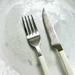 نمای نزدیک چاقو و چنگال میوه خوری مینیاتور