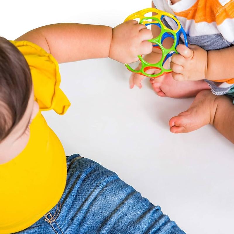 توپ بازی آموزشی ارگونومیک اوکلاسیک (Bright Starts Oball Classic Easy Grasp Toy - Red/Yellow)