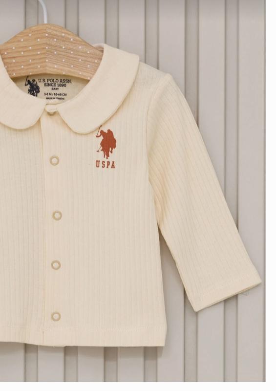 ست ۳ تکه بلوز، شلوار جوراب‌دار و کلاه نوزادی دخترانه کرم یو.اس. پولو اسن | U.S. Polo Assn baby set