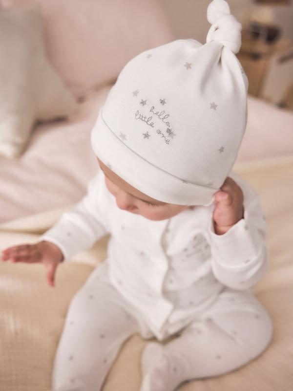 ست ۴ تکه سرهمی، بادی، کلاه و پیش‌بند نوزادی سفید نکست | Next baby clothes 