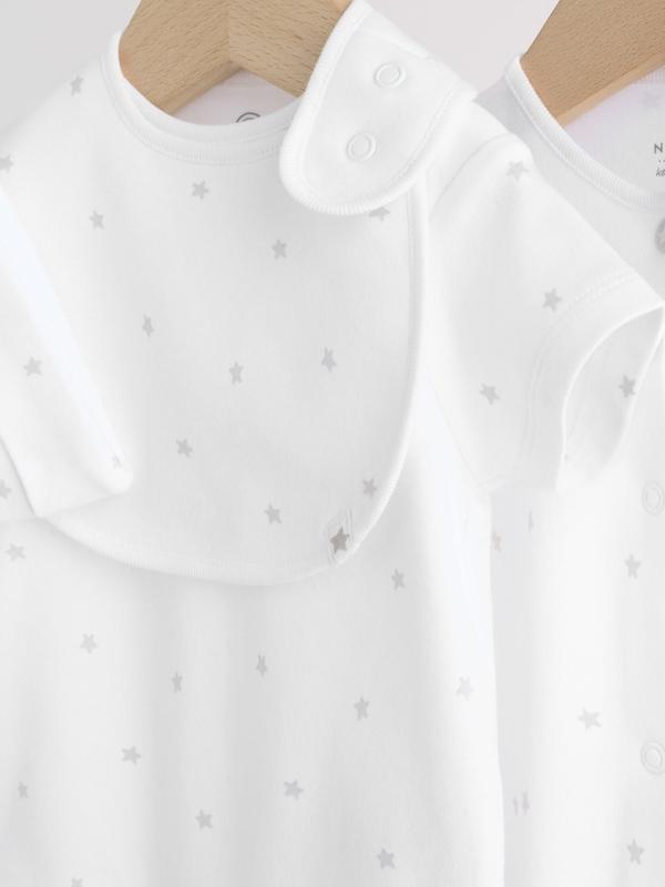 ست ۴ تکه سرهمی، بادی، کلاه و پیش‌بند نوزادی سفید نکست | Next baby clothes 