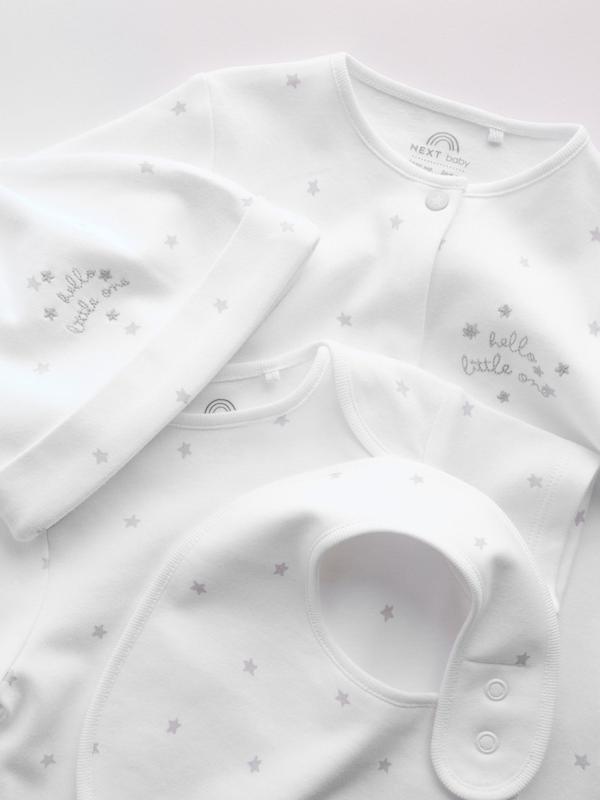 ست ۴ تکه سرهمی، بادی، کلاه و پیش‌بند نوزادی سفید نکست | Next baby clothes 