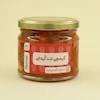 شیشه کوچک کیمچی قرمز کره ای از نمای روبرو