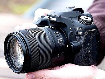 دوربین Canon EOS 80D و لنزIS USM EF-S 18-135