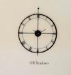 Modern metal wall clock