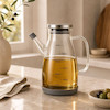 روغن‌ریز پیرکس با درب استیل و بدنه شفاف 600ML