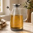 روغن‌ریز پیرکس با درب استیل و بدنه شفاف 1000ML 