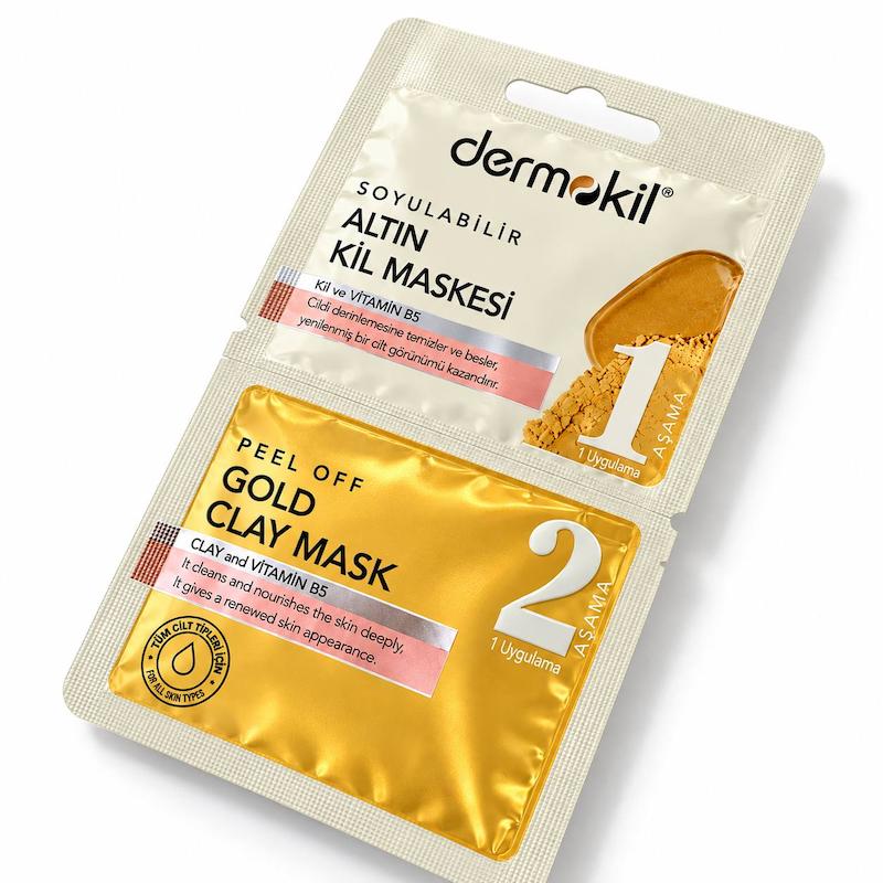نمای مورب بسته‌بندی ماسک خاک رس طلایی Dermokil با دو بخش شماره‌گذاری‌شده و عبارت Gold Clay Mask