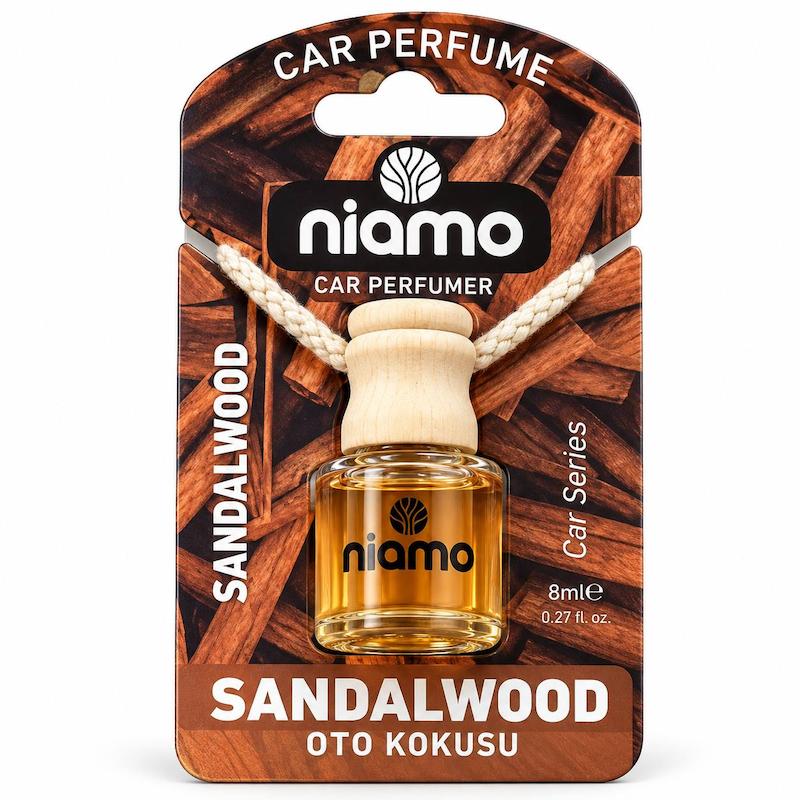 خوشبوکننده خودرو niamo مدل Powder با بطری شفاف، درپوش چوبی و بسته‌بندی صورتی، حجم ۸ میلی‌لیتر