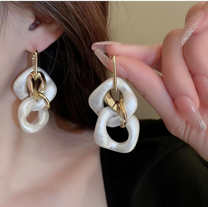 گوشواره مدل زنجیر صدفی