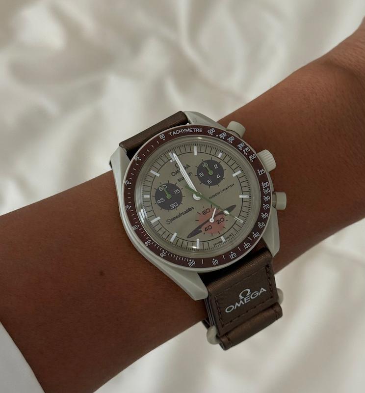 ساعت امگا سواچ زحل قهوه ای  Omega Swatch to Saturn