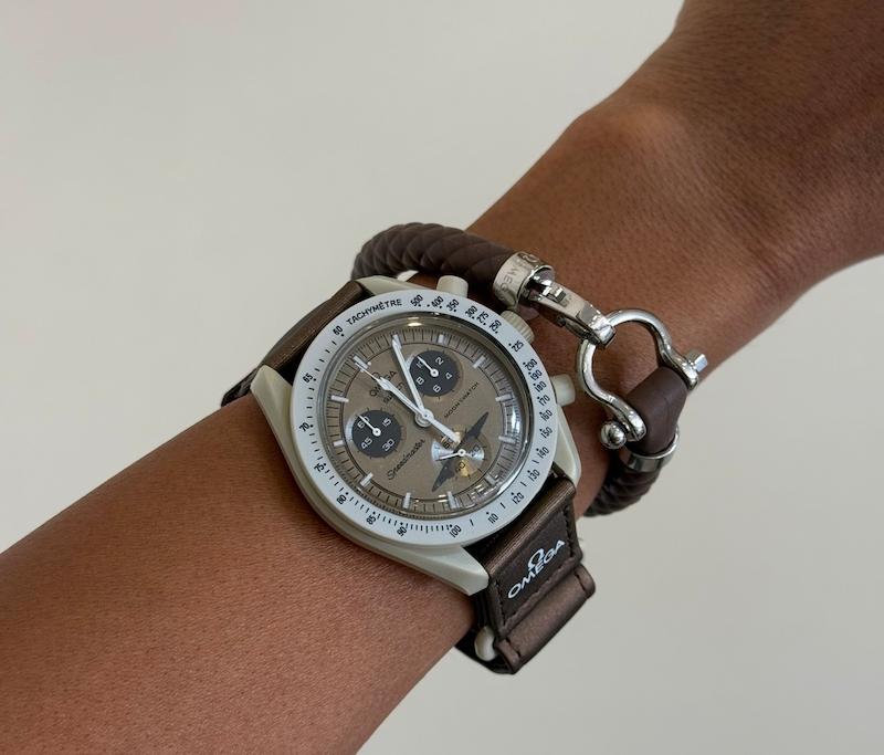 ساعت امگا سواچ زحل کرم قهوه ای  Omega Swatch to Saturn