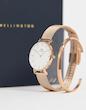 ست ساعت دنیل ولینگتون حصیری زنانه رزگلد صفحه سفید با دستبند Daniel Wellington Rosegold