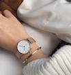 ست ساعت دنیل ولینگتون حصیری زنانه رزگلد صفحه سفید با دستبند Daniel Wellington Rosegold