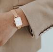 ساعت دنیل ولینگتون حصیری زنانه رزگلد صفحه مستطیل سفید  Daniel Wellington Rosegold