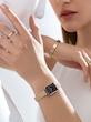 ساعت دنیل ولینگتون حصیری زنانه رزگلد صفحه مستطیل مشکی  Daniel Wellington Rosegold