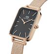 ساعت دنیل ولینگتون حصیری زنانه رزگلد صفحه مستطیل مشکی  Daniel Wellington Rosegold