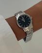 ساعت دنیل ولینگتون یونیتون زنانه نقره ای صفحه مشکی  Daniel Wellington Silver