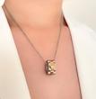 نیمست رولکس استیل طلایی نقره ای (گردنبند و‌گوشواره) ‏ Rolex steel necklace and earrings