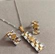 نیمست رولکس استیل طلایی نقره ای (گردنبند و‌گوشواره) ‏ Rolex steel necklace and earrings