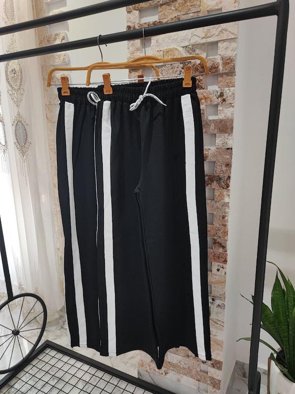 شلوار مشکی پرطرفدار  دو خط سفید کد 131