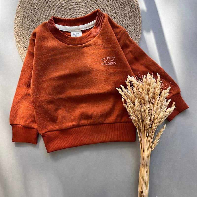 بلوز سلانیک اجری کد 00116008 - 6 ماه الی 3 سال