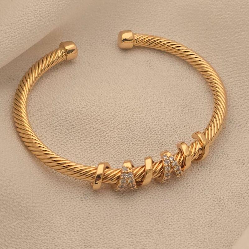 دستبند دیویدیورمن طلایی نگیندار