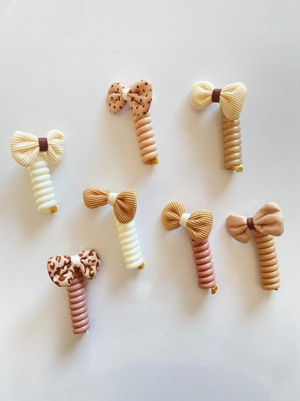 کش فنری پاپیون دار