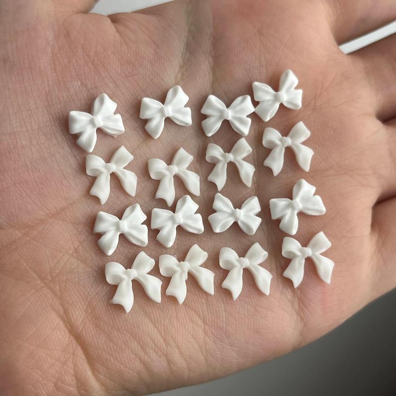 پیکسل ناخن-پاپیون سفید